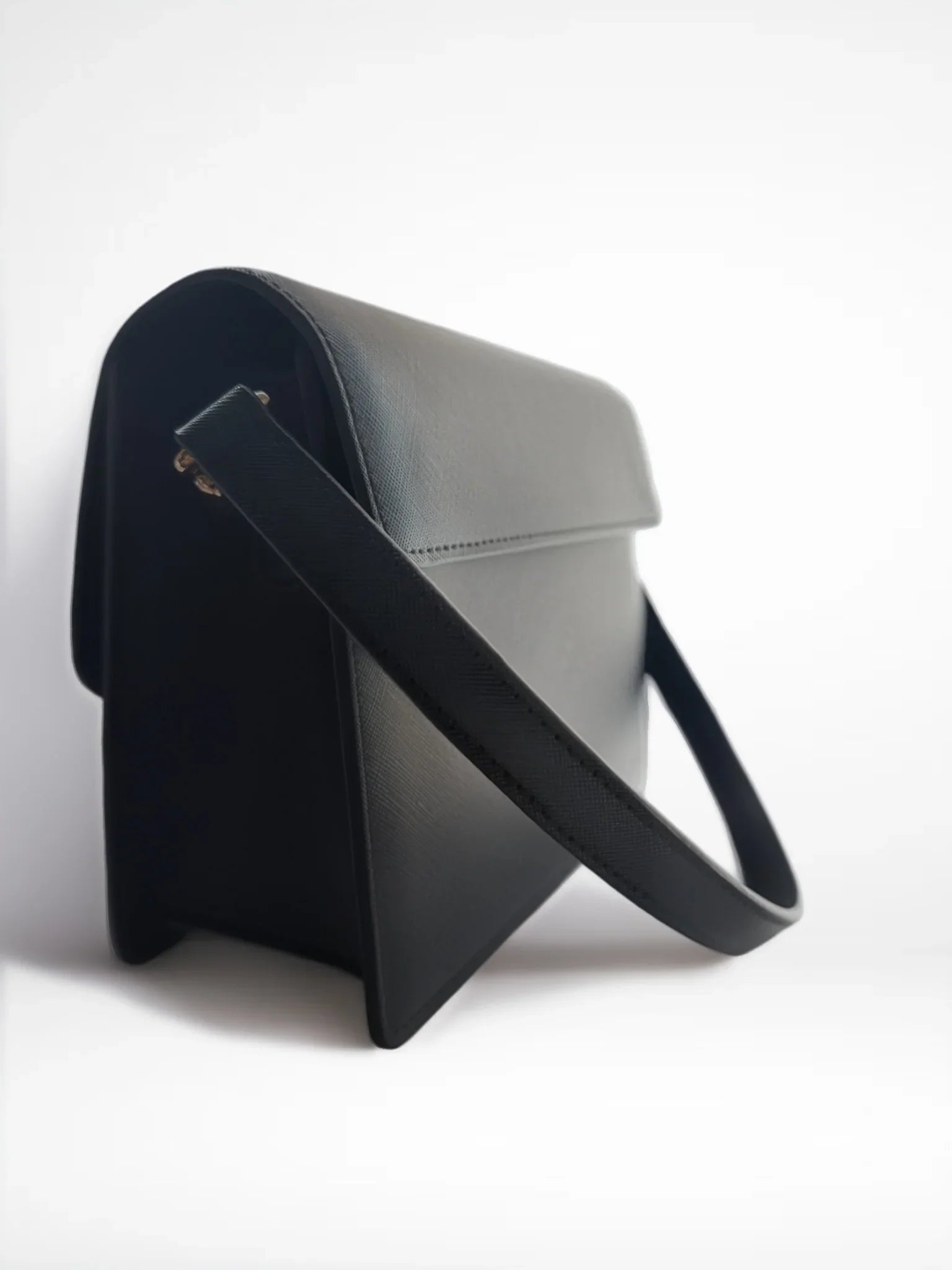 Two-toned handbag with black and gray colors on a white background